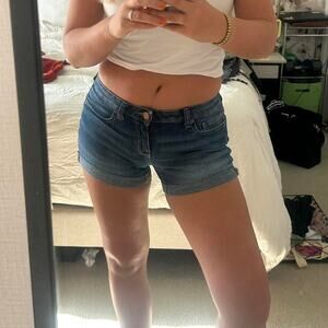 Mid rise blue denim shorts